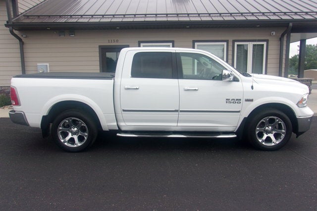 2017 RAM 1500 Laramie in Bright White Clearcoat — front three-quarter view