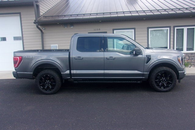 2023 Ford F-150 XLT in Carbonized Gray Metallic — front three-quarter view